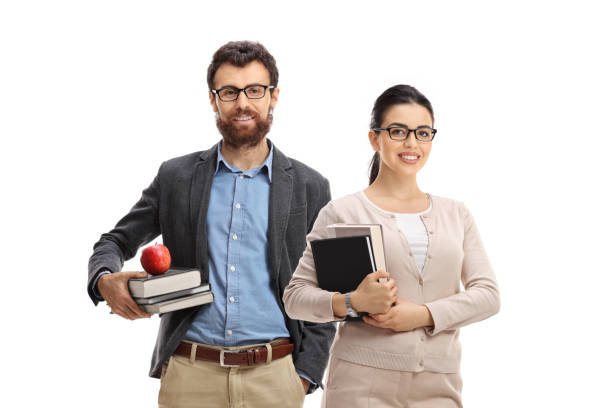 istock Teachers standing and holding books 1227586532