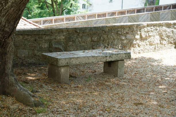 istock Benches and chairs at tables invite you to relax and unwind 1227586871