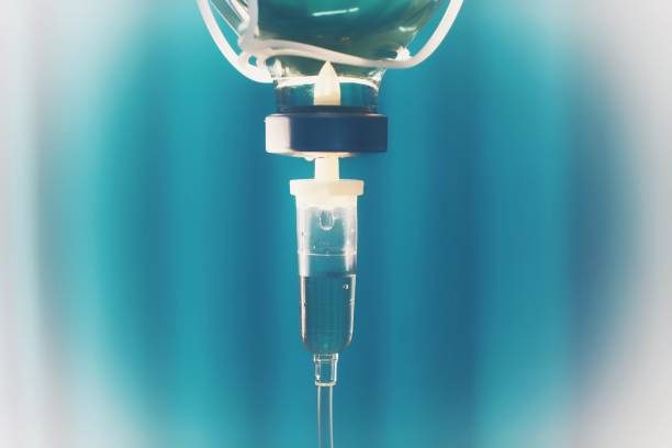 Set iv drip fluid intravenous drop saline drip hospital room,Medical Concept,treatment emergency and injection drug infusion care chemotherapy, concept.blue light background,selective focus stock photo stock photo stock photo