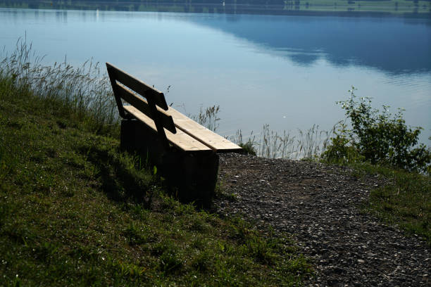 This are benches and chairs at tables invite you to relax and unwind