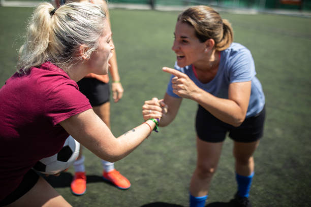 istock Female soccer players supporting each other before the game starts 1227588332