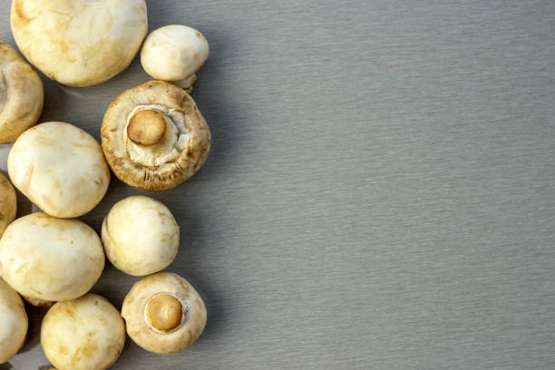 istock Fresh chestnut mushrooms on the table, copy space 1227590326