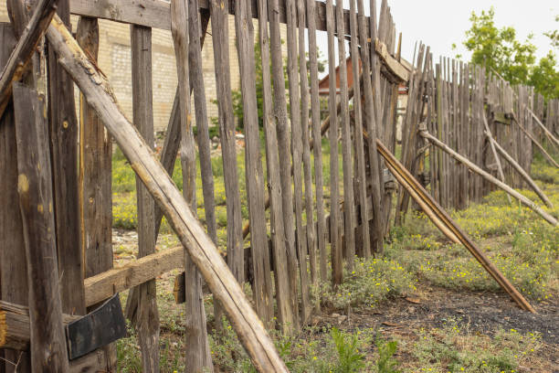 istock fence old wooden with props 1227591012