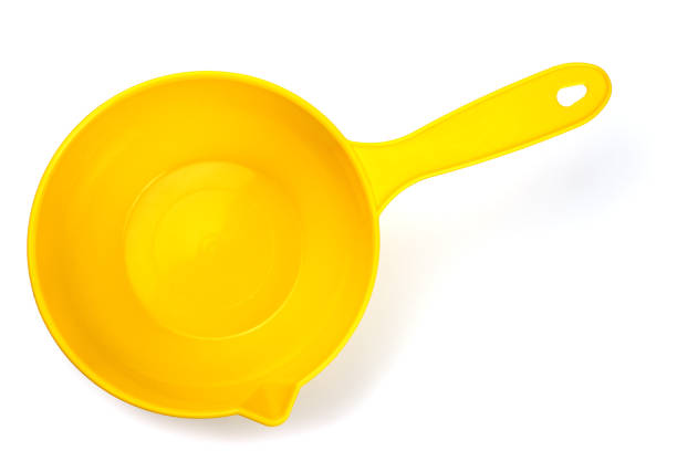 istock Yellow water scoop isolated on white background, top view 1227591192