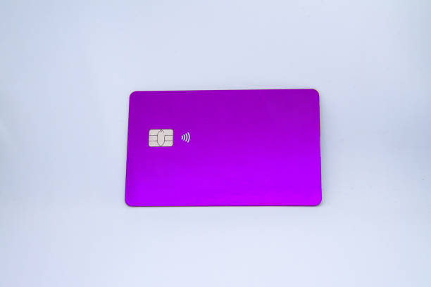 istock purple credit card with approach chip on a white background 1227591352