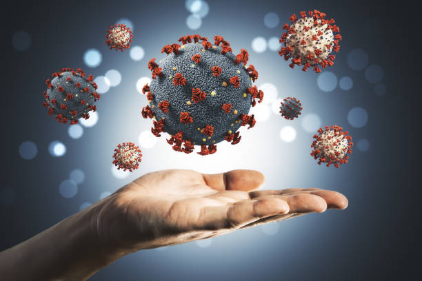 istock Hand holding virus cells coronavirus 2019-nCov. 1227591674