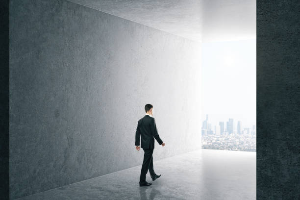 istock Businessman in interior with city view 1227592918