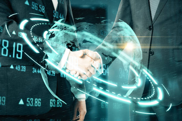 istock Businesspeople shaking hand and abstract financial interface. 1227593154