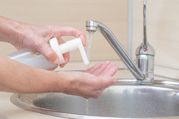 istock Coronavirus pandemic protection by cleaning hands frequently. 1227594236