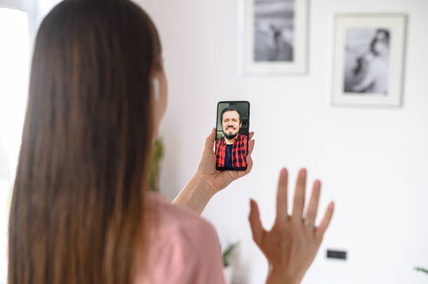 istock A young woman using phone for video call, zoom 1227596037