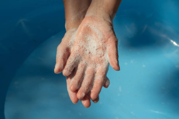 istock Hands wash with antibacterial soap 1227597678