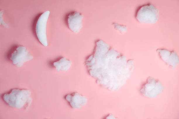istock Little moon with cotton clouds in a pink sky. Digital newborn backdrop. 1227601162