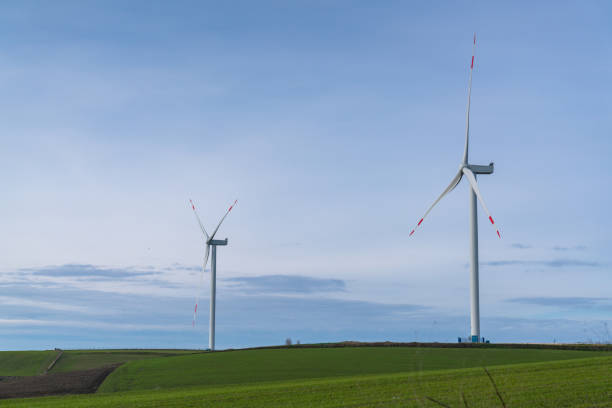 istock Wind turbine on a green field 1227603001