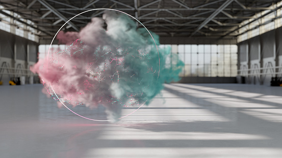 A soft coloured cloud, particles and glowing ring in an industrial building