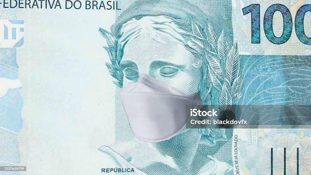 Brazilian real with face mask Paper Currency Stock Photo