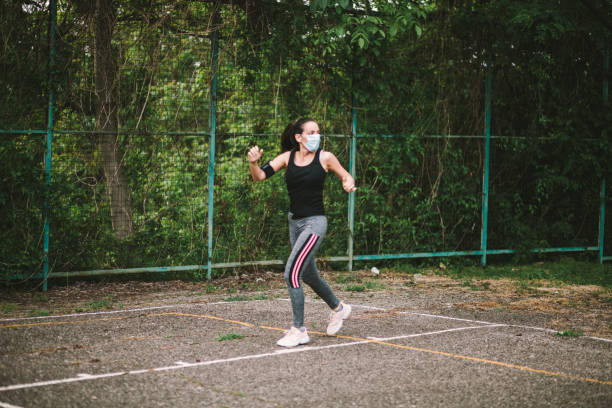 istock One young beautiful woman practicing sport 1227606017