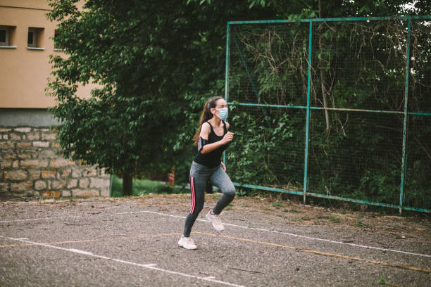 istock One young beautiful woman practicing sport 1227606309