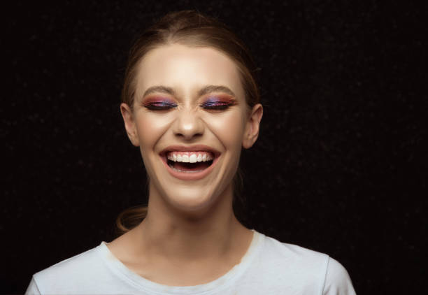 Studio Shot Portrait Of Beautiful, Charming Young Woman