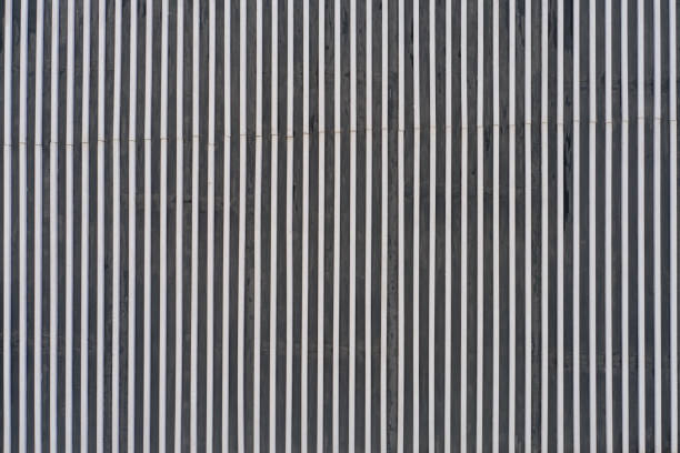 istock Background in the form of smooth vertical metal lines 1227610298