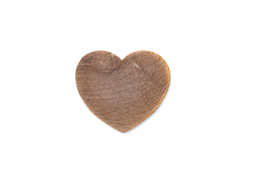 Wooden heart on white background.