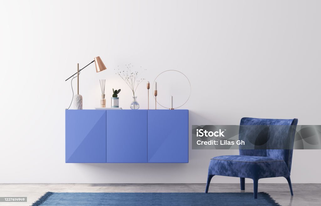 Interior design of luxury living room with stylish armchair, blue cabinet and elegant personal accessories. white wall in Modern home decor Template. Stock photo Interior design of luxury living room with stylish armchair, blue cabinet and elegant personal accessories. white wall in Modern home decor Template. Interior mock up 3D render Domestic Room Stock Photo