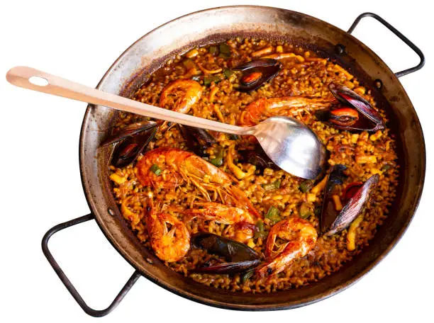 Photo of Seafood paella in metal pan