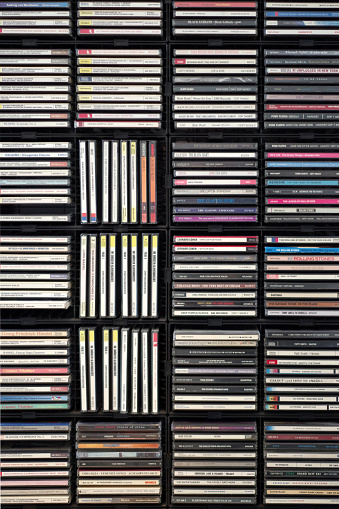 Close-up full frame view of a section of a large full shelf for a CD compact discs home library