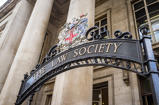 London, England - August 9, 2012: Ornate sign outside The Law Society's Hall on Chancery Lane in London, England