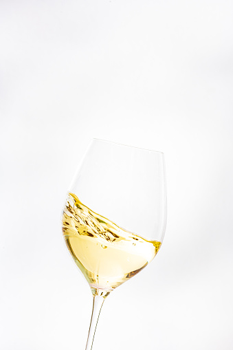 White wine swirled in a glass