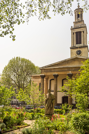 London, England - May 24, 2012: Henry Wood Hall and statue of King Alfred the Great in Trinity Church Square in Borough, in the London borough of Southwark, England