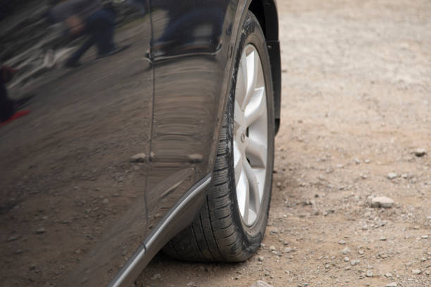 istock car tire in the street 1227618530