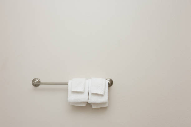 istock White hand towels on wall rack 1227618899