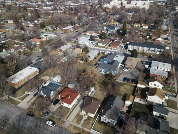 Fall neighborhood aerial Overhead drone shot of residential neighborhood in the fall provo stock pictures, royalty-free photos & images