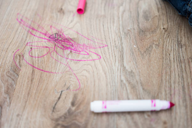 istock Child coloring on luxury vinyl flooring 1227618954