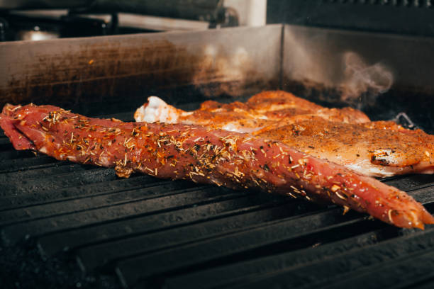istock frying meat in grill pan 1227620225