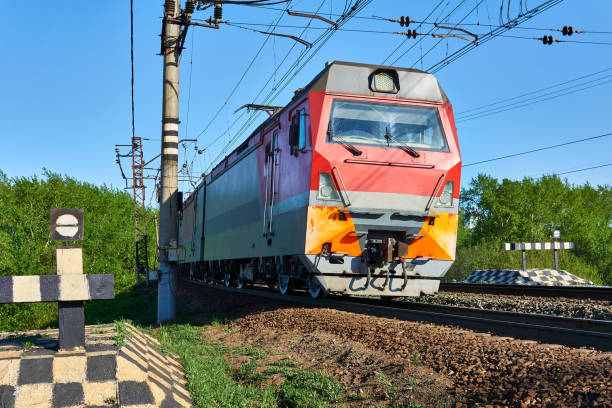 istock electric locomotive moves on rails between two trap road with buffer stops 1227621474