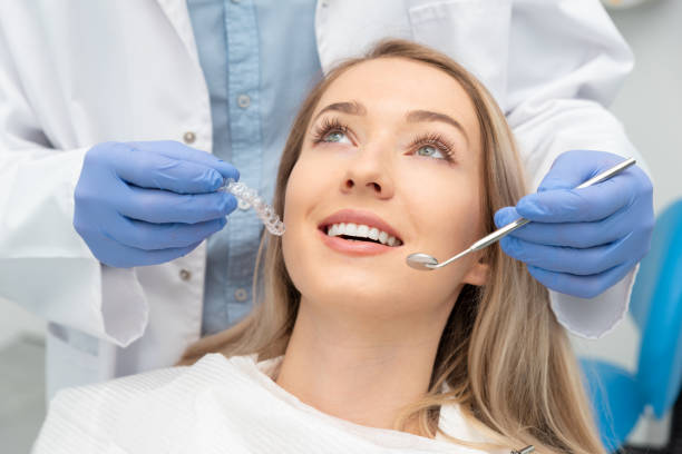 istock Woman having teeth examined at dentists 1227621677