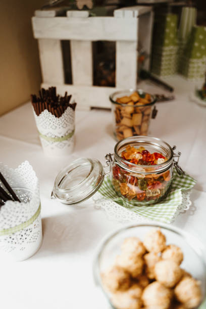 istock photo of candy bar jars on a table 1227623102