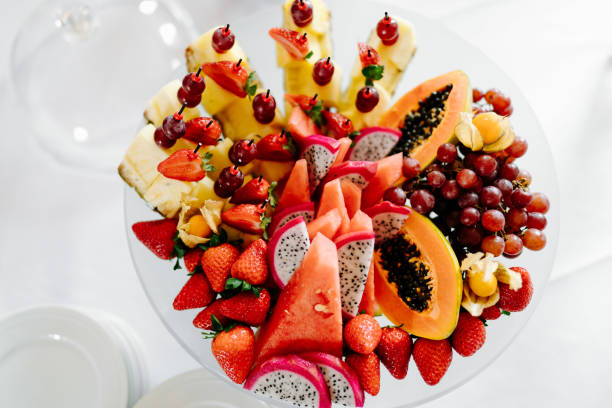 istock photo of fresh fruit slices plate on a table 1227623112