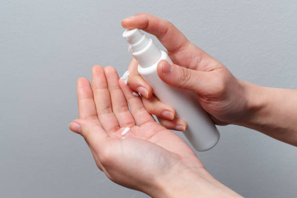 istock Female hands applying antibacterial liquid soap close up. 1227623450