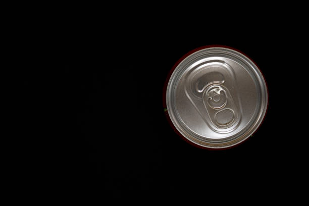 istock Soda can on a black background overhead shot 1227624754