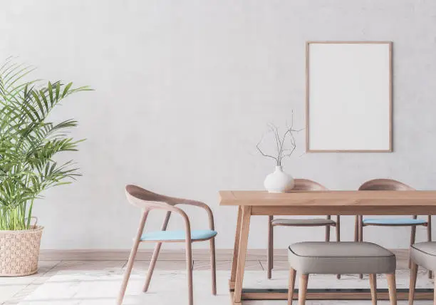 Photo of wooden chairs and table on gray wallpaper background. Scandinavian dining room interior design.	Stock photo