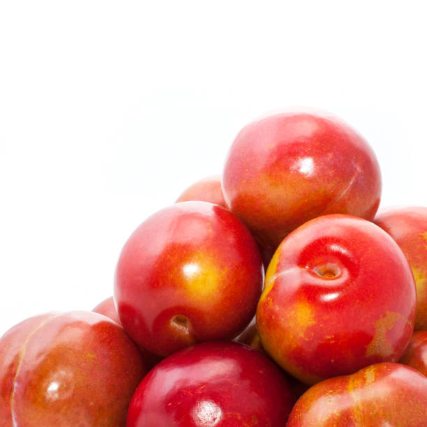 istock juicy, fresh, red plum, isolated 1227625164