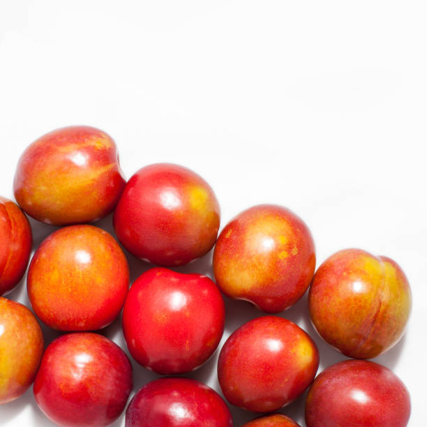 istock juicy, fresh, red plum, isolated 1227625206