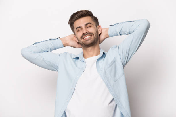istock Happy young guy stretching back, taking pause or break, relaxing. 1227629300