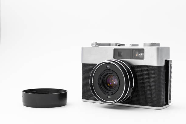istock retro film camera on an isolated white background 1227630459