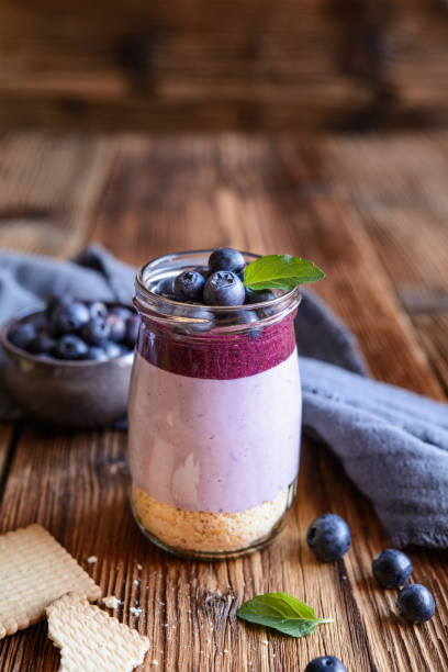 istock Blueberry cheesecake in a glass jar 1227630920