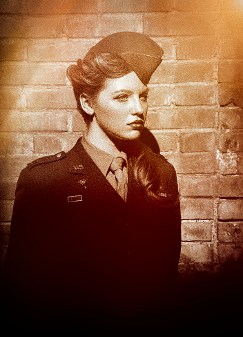 Sepia photo of a World War II female soldier
