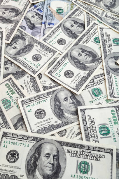 istock Texture US dollars. Background of one hundred dollar bills. 1227632337
