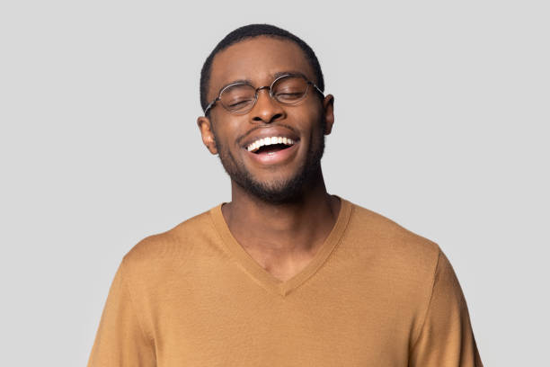 istock Head studio shot portrait handsome laughing African man 1227633049